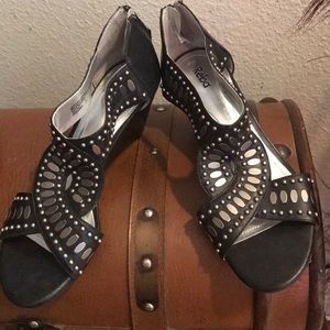 Reba!!! Silver studs and black leather